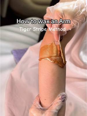 How to wax your arms✨ Using the “tiger stripe” method. Have you tried this technique yet?  Ir do you use long strips? Let me know which works best for you! Using Wild Honey Wax @Honeycomb Wax Company  Code: Jade10 10% off! #waxingtips #wax #waxingspecialist #waxer #waxtok #waxingspecialist #waxersoftiktok #hawaiiwaxer #hawaiiwaxing 