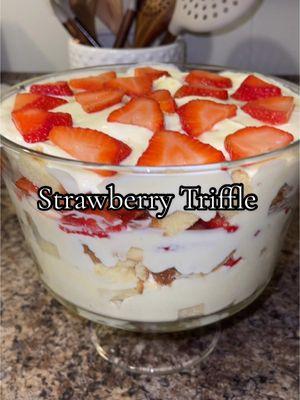 One of my most requested desserts at parties! 🍓🍰 Ingredients  - 2 lbs strawberries, washed and sliced - 1/2 granulated sugar - Family size Saralee Pound Cake, thawed - 1 family size instant vanilla pudding  - 3 cups milk - 1 small container of cool whip Instructions - Wash & slice strawberries - Add sugar to strawberries & refrigerate for 30 mins - Slice cake and cut into small cubes - Mix pudding with 3 cups milk - Add cool whip to pudding mixture  - Set aside enough strawberries for top layer  - Layer cake, pudding & strawberries & repeat - Let sit in fridge for atleast 1 hour before serving #strawberries #strawberrydessert #strawberryshortcake #shortcake #desserts #baking #cooking 