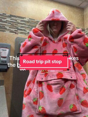 On my way to get my puppy wearing the coziest thing everrrr 🍓🩷✌🏼 #hoodedblanket #wearableblanket #blanket #roadtrip #minnesota #wisconsin #illinois #travel #pitstop #mainstreetfam #comfy #fyp #cute 