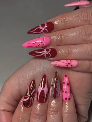 sugar, spice & everything twice🍭❤️🎀 #midlandtx #midlandnails #midlandtxnails #westtexas #432 #girlynails #daliaorteganails #gelx #gelxnails #apresgelx #mixandmatchnails #capcut #trendingnails #nailsofinstagram  #nailinspo #nailideas #nailporn #christmasnails #redpinknails #coquette #coquettenails #almondshape #almondnails 