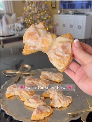 So cute and delish! 😋  🎀 Form a ball with the dough of 2 crescent rolls 🎀 Use a rolling pin to flatten into a circle  🎀 Slice and form a bow shape as seen in the video  🎀 Sprinkle cinnamon and sugar on the top of each one 🎀 Bake at 375 for 10 minutes or until golden brown  Cream Cheese Frosting:  🧁 Mix together 4 oz cream cheese, 1/4 cup of butter, and 1 teaspoon of vanilla until well combined 🧁 Mix in 2 cups of powdered sugar  🧁 For a thinner frosting, add a splash of heavy cream or milk  Spread or brush frosting over the tops of each roll and enjoy! 😋   Let me know what you think if you try it! #Recipe #baking #christmasrecipe #bowseason #sweettreats #crescentrolls #cinnamonrolls #breakfastideas #EasyRecipe #bowlover #brunchideas #dessert #pastry 