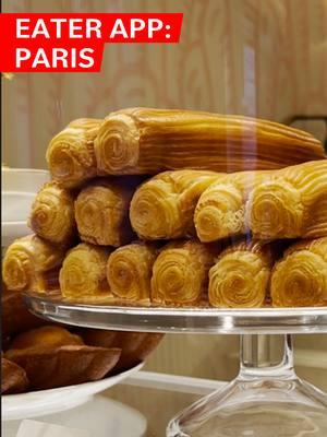 If your first stop in Paris isn’t for pastries, it should be. But don’t get lost in the dozens of patisseries to choose from. 🥐 After exploring the Louvre, Nori De Vega (@nomnom_nori) turned to the Eater app to help her decide where the best Eater-editor-approved pastry shops were nearby, and discovered the Ritz Paris le Comptoir. From their signature Ritz au Lait shortbread, to a case full of photo-worthy glazed madeleines, to a lobster roll made with a croissant, every treat at this Paris patisserie is truly a masterpiece. Explore Paris, and over 100 more cities, with the free Eater app. Download it at the link in our bio. #paris #pastries #parisfood #eater