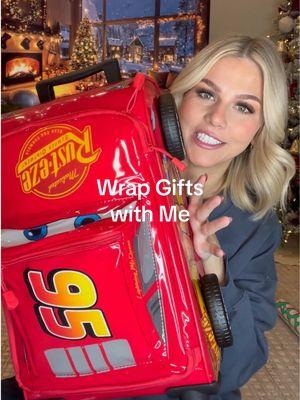 He might like cars just a little bit! 🚗🎅🏼 #wrappinggifts #wrap #wrapping #wrappingpresents #christmashaul #christmas2024 #kidsgifts #christmastiktok #fyp #viralvideo 