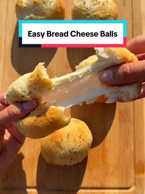 EASY Bread cheese balls 🥰 Make these in 10 minutes!! Pro tip is if you make them jumbo like this make sure mozerella sticks are room temp or microwave for a bit so they aren’t super hard from the fridge. This will help the jumbo one melt better!! #EasyRecipe #cheesebread #cheese  #bread #cheesybread #recipesoftiktok #Recipe #easyrecipesathome 