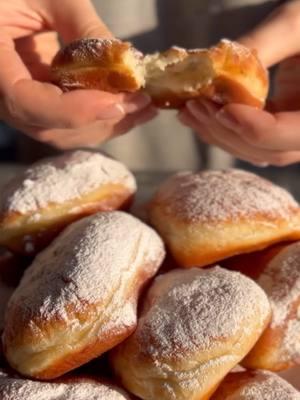 Cafe Du Monde beignet recipe - New Orleans square donuts! by @adikosh_123 8½ cups/2 liters oil for frying Powdered sugar For 20–30 beignets: 2.2 pounds/1 kilogram all-purpose flour 3 tablespoons/50 grams fresh yeast, or 1 tablespoon + 1 teaspoon instant yeast ½ cup/100 grams sugar 2 large eggs 1 egg yolk 1 cup/240 milliliters lukewarm water 1½ cups/360 milliliters milk 3½ tablespoons/50 grams butter A pinch of salt In a stand mixer bowl, combine all the dough ingredients. Attach the dough hook and knead on low speed for about 8 minutes. Start at speed 1 and gradually increase to speed 2. The dough is ready when it separates from the sides of the bowl and becomes smooth and slightly sticky. Transfer the dough to a greased bowl, cover, and let rise at room temperature until doubled in size. Heat oil in a pot to 350–360°F (175–180°C). Once the dough has risen, transfer it to a floured surface. Lightly flour the top and roll the dough out to a thickness of ⅓–½ inch (1–1.5 cm). Cut into small squares. Fry the dough squares in the hot oil for a few minutes on each side until golden.  Remove with a slotted spoon and place on paper towels to drain. Arrange on a serving plate and generously dust with powdered sugar. Optionally, serve with jam, pastry cream, or chocolate spread. Tip: Beignets are best enjoyed on the day they’re made, ideally close to frying time. Kneading takes about 8 minutes in a mixer; start on low speed and increase gradually. #cafedumondebeignetrecipe #beignetrecipe #beignets #donutrecipe #hanukkah #sufganiyot #sweetdishesrecipes #tastyrecipesvideos #HolidayTreats #christmasbaking #christmasdesserts