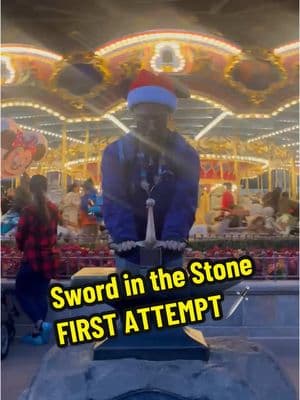 We all know about the rivalry between @JoJo and the Sword and the Stone.  But, will I have some good luck on my first try? Let's find out. @Disney @Disney Parks #disney #disneyparks #waltdisneyworld #disneyworld #disneyworldchristmas #disneychristmas #magickingdom #magickingdompark #fantasyland #swordinthestone 