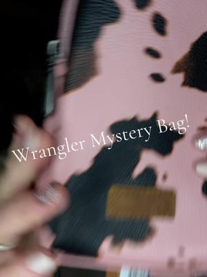 Its perfect for christmas shopping! No more big purse! #wrangler #wranglermysterybag #stylish #western #westernpurse #cowprint 