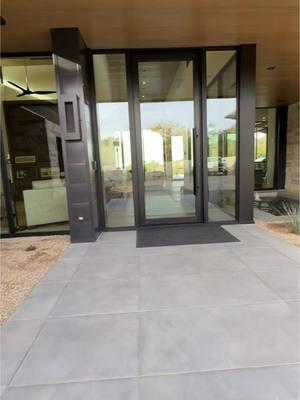 This beautiful entry at our #BalancingRock Project features a beautiful fountain with Full height glass on one side, and a desert garden on the other.  #entry #AFTConstruction #fountain #Scottsdale #Design #InteriorDesign #Skylight #Modern #Architecture #ModernArchitecture