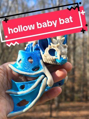 An adorable little hollow bat is headed to it's new home, guarded by the bestest of dragon friends.  #oddsandendsdesigns #3dprinting #shopsmall #resin #functionalart #fidget #friend #cinderwing3d #authorizedseller 