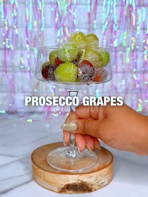 12 grapes at midnight… but make it PROSECCO! 🍾☺️ Did you indulge in this tradition last year? Was it worth it?? Talk not me… I need to know so I can be ready for 2025!! 🎉🎊🥳 NYE Prosecco Grapes ✨🍇 Grapes Prosecco  Vodka (optional) Sugar ——— 1- wash your grapes then soak them in Prosecco (& vodka) for 3-4 hours or overnight 2- drain them, pat them dry then roll them in sugar 3- refrigerate until ready to serve #Cheers #CocktailsWithWhiskey #drinks #cocktails #proseccograpes #nye #nyd #12grapes #drinks #happyholidays #happynewyear #2025