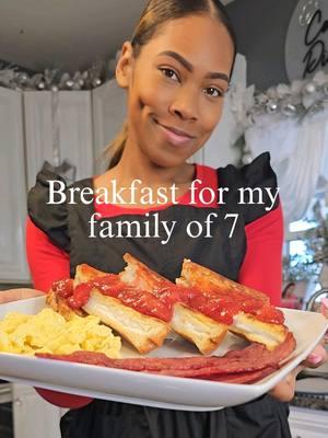 Sunday Breakfast for my family of 7. Today, we had Cheesecake Stuffed French Toast with a homemade strawberry compote with some scrambled eggs and turkey bacon on the side. #EasyRecipe #cookingwithdimples #frenchtoast #cheesecake #breakfastideas #family #griddle #momlife #breakfastideas #blackpeople #momlife 