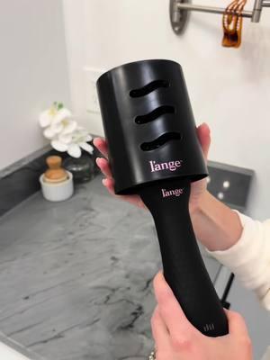 Say goodbye to juggling hair tools! The L’ange Brush Blow Dryer dries and styles your hair in one step, leaving you with smooth, salon-quality results in minutes. Effortless beauty.  #HairGoals #BlowDryerBrush #langehair 	#HairStyling #BeautyHacks #HairCareRoutine	#SalonHairAtHome	#EffortlessHair #MustHaveBeauty #BeautyGadgets