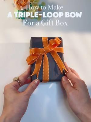 How to tie a three-loop bow on a gift box with ribbon giftideas #easytutorial #howto #DIY #giftguide #handmadegifts #crafts #art #giftbox #bow #ribbon