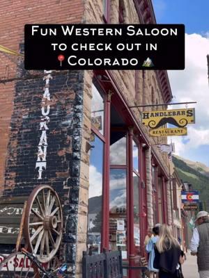 Check out this fun Western saloon in Silverton, Colorado! 🏔️☀️🚂 📍Handlebars Saloon It is open only during the summer months, and is a must-visit in 2025. You can reach Silverton by driving the stunning Million Dollar Highway from Ouray or taking the scenic train ride from Durango. Don’t forget to try their award-winning buffalo chili—it’s a local favorite! #silvertoncolorado #durangocolorado #durangosilvertontrain #trainride #westernsaloon #explorecolorado #train #miningtown #rockymountains #colorado #fallincolorado #coloradoadventures 