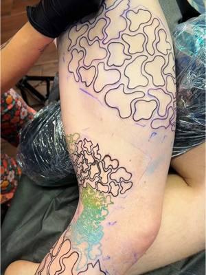 Two extra-long, full days of tattooing to get our outline on this massive tattoo! 💜🩵💚 Stencil placement took a few hours - some parts printed stencil, some parts hand-drawn. Mapped out colors used for outlines & got down a formula 💪 Pumped to keep working in this 🖤🩶💜💙🩵💚🩶🖤 #tattoo #tattooartist #tattooartistsoftiktok #tattooart #foryou #contemporarytattoo #femaleartist #femaletattooartist #texastattoo #atxtattoo #austintattoos #legtattoo #legsleeve #legsleevetattoo #largescaletattoo #customtattoo 