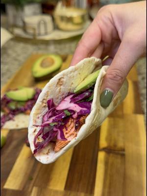 Salmon Tacos 🌮🥑🌿 RECIPE BELOW 📝⬇️ INGREDIENTS: •small flour tortillas •salmon •avocado, for serving •1 tsp olive oil •chili powder, cumin, paprika, garlic powder, cayenne, oregano, salt and pepper Slaw: •red cabbed, thinly sliced •1/2 jalapeno, diced •1/4 cup cilantro, chopped •1-2 likes, juiced •salt, to taste Salsa: •2 tomatillos •1/2 jalapeno •1 lime •1/4 red onion •salt and cumin DIRECTIONS: •Preheat oven to 400 degrees.  •Drizzle olive oil over salmon and add seasonings. Bake salmon for 10-12 minutes. •Char your tomatillos, red onion, and jalapeno in the oven, gas or grill pan. Add to blender and blend until smooth. Refrigerate until serving. •In a large bowl combine slaw ingredients. Refrigerate until serving. •Warm tortillas. •Add salsa, salmon, and slaw. Add toppings of choice like avocado. #salmontacos #tacotaco #healthytacos #highproteintacos #weeknightmeals #tacorecipes #tacoreveal #atlfoodie 