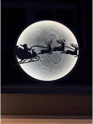 We had a witch fly thru the moon for Halloween and now we have Santa's sleigh flying thru it for Christmas. It's so magical. Maybe we’ll do E.T next year.  We absolutely love how it's working out for the holidays. What do you think? #diymoon #diyhalloweendecor #diyhalloweendecorations #moonart #nasa #moon #spacex #moonlight #moon #diyprojects #easydiy 