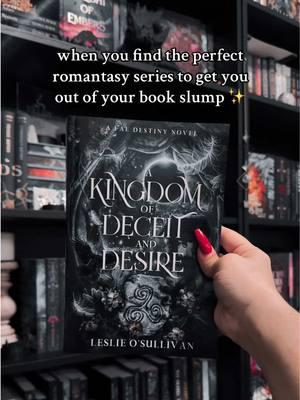 Thank you SO much @The Nerd Fam and @LeslieOSullivanWrites for this GORGEOUS book mail!!!! Eala and Sionnach's adventures from "A Kingdom of Souls and Shadows" continue as they time travel through Irish history, folk tales, and mythic gods to unravel a riddle that, if unsolved, will tear them apart.   Please note, this is book 2 in the "Fae Destiny" series. Being tied to the Fae is no guarantee the folk will open their gates to welcome you in. Believing they've earned a place in the Faerie kingdom of Tír na nÓg, Eala, a folklore academic, and her time traveler soulmate, Sionnach, are about to face the harsh reality that mischief and misdirection lurk at the very core of Fae bargains. When Finnbheara, King of the Connacht Fae, confronts the pair on the threshold of his domain, he declares only Eala, by virtue of her Faerie origins, is welcome into his land of eternal youth. Desperate not to be separated from Sionnach, she agrees to a bargain with the wily king to grant the lovers a future together in the Fae realm. The only help offered in solving the royal challenge is from the sexy yet duplicitous Faerie, Robber Bright, arrogant commander of the Host of a Thousand Wings...which might be worse than no help at all. Now, with a looming lunar deadline and dark forces at work against them, Eala and Sionnach must time travel through the magical Veil, taking part in Irish history and folk tales to unravel the truths hidden in Finnbheara's enigmatic challenge. #BookTok #akingdomofdeceitanddesire #thenerdfam #fantasyromance #romantasy #faebooks #lesliesullivan 