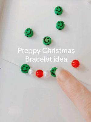 Idea tutorial for a Preppy Christmas Bracelet Idea using pearl beads, smiley beads, glass beads, stretchy string.  #bracelets #preppybracelet #holidaybracelet #braceletideas #bracelettutorial #beginnerbracelet #preppy #beads #smileyfacebeads #xyzbca #fyp #beadmath 