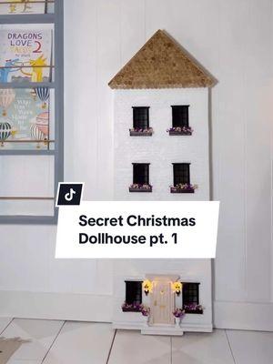 Secret Christmas Dollhouse Build — PART 1 — the exterior is done and can you even with the cuteness? Last Christmas, I finished out the attic space next to our girls’ room and turned it into the cutest little hang out space complete with a secret mirror door with I’m still not over. This year I’m adding to it! I built a tall and thin doll house box out of 1x12s in a 1:12 ratio. So I have 9” ceilings that translate to 9’. Make sense? Then I added plywood on the back and fit it between the studs so I could set it back and not have it take up floor space. I built my front out of 1x2s and 1/4” plywood, and used joint compound to create a German schemer painted brick situation that I actually LOVE. I used popsicle sticks for the roof and stained them aged oak. Added in windows that I painted black, and built tiny window boxes for them that I filled with tiny flowers! Then the pink door, lights that actually work, and planters really brought it together! Next I’m finishing out every room inside in a way that the girls can redesign & rearrange. What do you think so far? And no — they won’t peek!! They can’t wait to be surprised on Christmas!!  #dollhouse #dollhousebuild #diydollhouse #playroomideas #secretdoor #christmasbuild #hgtvmagazine 