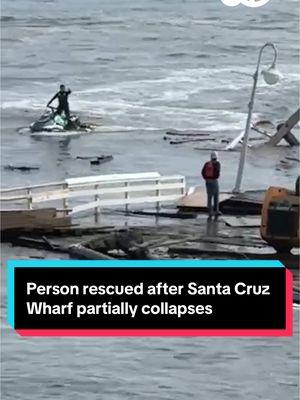 Video captured the moment a person was rescued after the Santa Cruz Wharf partially collapsed on Monday. In the video, you can see a person standing on a part of the wharf floating in the water as a rescuer on a jet ski picks them up. In total two people had to be rescued and one other was able to get out of the water on their own. #santacruz #santacruzwharf #storm #weather #california #abc7news 