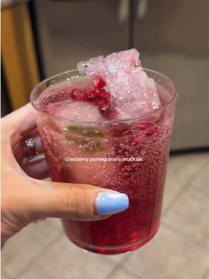 @Drink Poppi cranberry fizz + pomegranate juice/seeds (with mint ice cubes) #drinkpoppi #sodasback #cranberryfizz #gutfriendly #mocktail #drinktok #foodies 