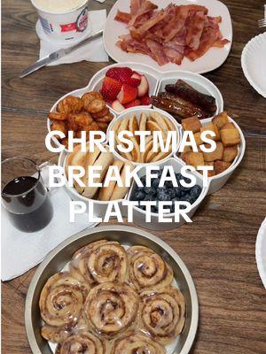 Christmas Breakfast Platter 🤤 Mini bagels, strawberries, blueberries, mini pancakes, mini hash browns, sausage, & french toast sticks cut up!  We also had a side of bacon and cinnamon rolls! We were full until dinner time lol  We heated everything all togehter in the oven and air fryer so the food would be hot still 😊  #christmas #christmasbreakfast #breakfast #breakfastideas #christmasbreakfastideas 