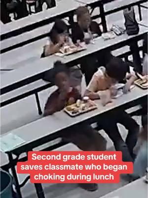 Video shows a second grade student saving his classmate who began choking during lunch last month at their school in Mesa, Arizona. The child, Thomas Conley, noticed the other student struggling and quickly performed the Heimlich maneuver to help. The student was honored by the Mesa Fire and Medical Department for his bravery during a ceremony at school on Dec. 17. #mesa #arizona 