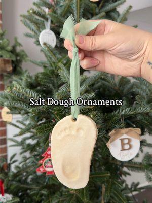 Salt Dough Ornaments  2 cups flour, 1 cup salt, 1 cup warm water. Add flour as you go when you knead and roll the dough. Bake @ 200 degrees for 3 hours. I put mod podge gloss over these to create a glossy look and seal them to last longer. Select the ribbons you want, and you’re done! The perfect gifts for Christmas or a keepsake for your tree. 🎄🎁✨ #saltdoughornaments #christmas #saltdough #ornaments #keepsake #gift #handprint #footprint #crafts #christmastiktok #baby #babycrafts #babytiktok #mom #firsttimemom #DIY #diyproject #foryoupage #fyp #creatorsearchinsights 