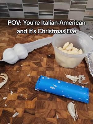 Christmas Eve is one of my favorite holidays to host, but I don't love having to peel so much garlic. #christmaseve #italianamerican #italianamericanfood #familytradition #artichoke #seafood #feastofthesevenfishes #buonnatale 