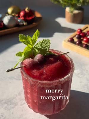 Day 24 of “24 Days of Holiday Spirits!” We made it!! 🎄 Closing out the series with a Merry Margarita - it’s frozen and festive and couldn’t be sexier. I hope you all enjoy today with family and friends. THANK YOU for celebrating the season with my spirits and I! ✨ • Merry Margarita • Rim glass w/ sugar 1 cup frozen cranberries 1.5 oz tequila 1 oz orange liqueur  .5 oz lime juice .75 oz spiced cranberry syrup  Add ice Blend Pour Garnish w/ mint + sugared cranberries  Enjoy! #thatsthespirits #24daysofholidayspirits #holidayspirits #merrymargarita #margarita #tequila #christmas #christmascocktail #christmasdrink #cocktail #drink