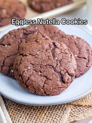 Easy Eggless Nutella Cookies 🍪🥛 Last minute eggless cookie recipe to bake for Santa or just to enjoy for the holidays or to share with family and friends! You need just 5 ingredients to make them. They are soft and chewy with crisp edges and bursting with hazelnut chocolate flavor!  They are the perfect treat!!  Wishing everyone Merry Christmas and Happy Holidays!  Comment 'nutella cookies', and I will send you the recipe  #nutella #cookies #nutellacookies  #egglesscookies #christmascookies #cookiesforsanta #holidaybaking #christmasbaking 