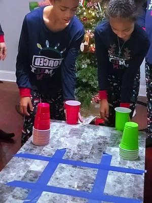 #CapCut This one got competitive #christmas2024 #Christmas2024Ornaments #christmas #family #games #partygame #christmasgames #familygames #familygamenight #holiday #holidaygames #matchingpjs #flipcuptictactoe #flipcupchallenge 