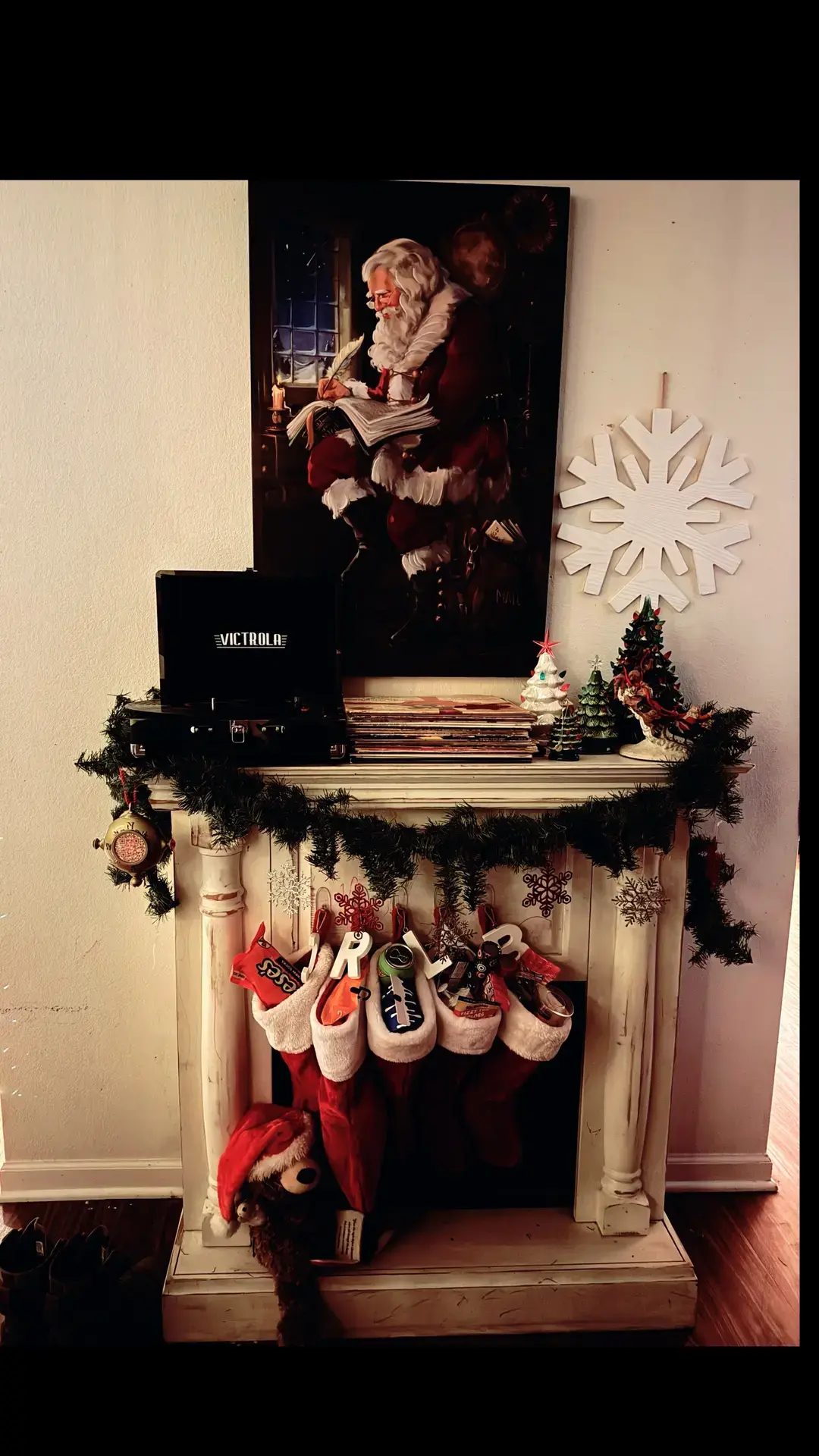 The pop/candy/looking bags in the stocking were actually underwear and socks it was so cute❤️ Merry Christmas everyone !!!#christmas #santa #record #ceramictree #stockings 