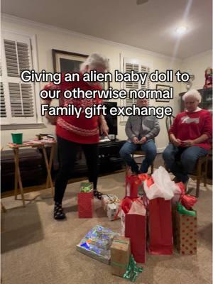 Decided to spice things up this year 👽#christmas #family #prank #whiteelephant #TikTokShop #funnygiftexchange #giftexchange #gift #holliday #presents #haul #babydoll #alien #christmasmorning #xmasprank 