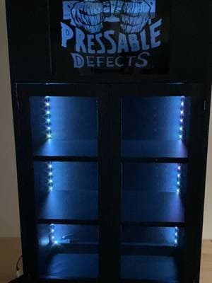 The finished cabinet. Had fun with this project. #cabinet #comics #fyp #comictok #cabinetry #custom #neonlights #builder 