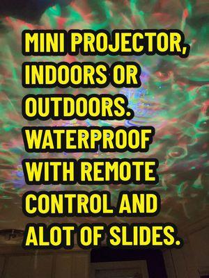 MINI PROJECTOR FOR OUTDOORS OR INSIDE, WATERPROOF WITH REMOTE CONTROL, HAS ALOT OF DIFFERENT SLIDES. #projector #outdoorprojector #fyp #viral #indoorprojector #tiktok #fypシ゚viral #fypage #waterproof #fy #remotecontrol #110v #110volt #slides #mademyyear #watch  #ttsdelightnow #giftguide #spotlightfinds #treasurefinds #christmassale #christmassales #lookatthat #christmasdeals #savings #tiktokshoplastchance #tiktokshopnewyearnewaura #TikTokShop #tiktokshopping #trending2024 #viralvideos #onsale #flashsale #giftideas #giftidea #tiktokshopfinds #tiktokmademebuyit #foryou #foryoupage #trending #wow #tiktokmademedoit #getyours #today #tiktokfinds #tiktokfind #tiktokviral #tiktokviralvideo #tiktokviraltrending #ttsacl 