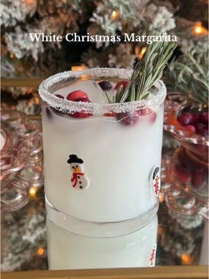 White Christmas Margarita! ☃️🎄🌨️ Merry Christmas!! ‘Tis the season for festive margs! Recipe below.👇🏼 - 3/4 oz lime juice - 3/4 oz simple syrup or agave  - 1 oz coconut milk  - 1 oz triple sec  - 2 oz tequila Blanco  Shake all ingredients well and pour into a sugar rimmed glass. Garnish with cranberries and rosemary for that festive feel and enjoy! Cheers & follow for more holiday cocktail recipes. 🥂🎄🤩🎅  #thespritzeffect #christmascocktails #christmasdrinks #whitechristmas #margarita