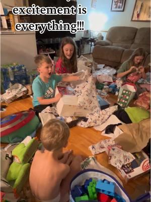 He finally got his PS5 and this baby’s reaction is everything! This is why moms go so hard for their babies on Christmas!! ❤️❤️🥹 sooo sooo glad I was finally able to do this for them all!!! #MomsofTikTok #christmas #mamaclaus #fyp #foryoupage 