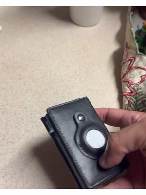 My husbands new wallet I got him for Christmas has a built in spot for trackers//AirTags so when lost you can find it’s location.😅😉Ive linked it to this post.  . . . #menswallet #wallet #wallets #TikTokShop #mensfashion #wallettok #airtag #tracker #lostwallet #wallettracker #giftideas #airtags #fyp