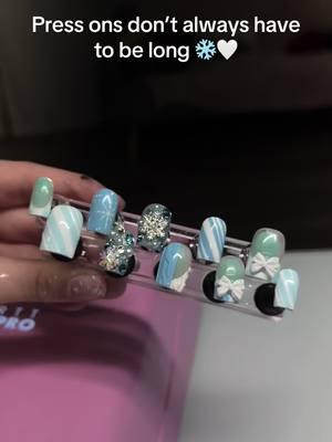 Loved how these turned out 🩵 #nails #nailtech #winternails #holidaynails #pressonnails #nailinspo #shortholidaynails #babybluenails #sweaternails #candycanenails #bownails #snowflakenails #nailcharms #blingnails 