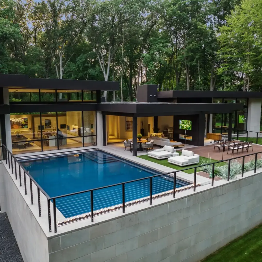 Whether you’re hosting a party in the outdoor lounge, enjoying a quiet evening in the living room, or having a movie night in the basement, this home has a space for everything.  Which space is your favorite? #livingroomdesign #luxuryhomes #basement #staircase #realestate #architecture #azdarchitects #staircasedesign 