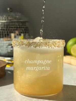 More champagne in 2025!! Starting with this Champagne Margarita. 🍾 Here’s how to make it: • Champagne Margarita • Rim glass w/ sprinkles  1.5 oz tequila .5 oz orange liqueur  .5 oz lime juice  Edible glitter Shake w/ ice Strain over ice  Top w/ champagne Stir Enjoy! #thatsthespirits #champagnemargarita #champagne #margarita #newyearseve #newyear #happynewyear #2025 #cocktail #drinkrecipe