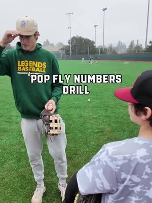 ⚾️ Pop Fly Numbers Drill 🥎 A fun and simple drill to teach beginners how to catch pop flys.  ✅ Teach pop fly form ✅ Put players side by side on a line  ✅ Give them a number ✅ Call out a number as your throw a pop fly ✅ 1 point per catch ✅ Have fun!  #baseball #littleleague #homerun #travelball #summercamp #fun #baseballseason #littleleaguebaseball #softball #MLB #speedball #legendsbaseball #sports #outfield #popfly #outfield drill #youthbaseballdrill