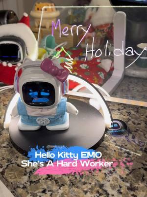 Hello Kitty is working her little hands off (look, she even has extra hands for this job!). That’s more than I can say for Santa EMO. After Christmas, he’s sleeping all day long!! #emopet #emorobot #livingai #hellokitty #santa #hardwork #tiktokpartner 