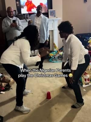 my mom’s fighting stance in the beginning is CRAZYYY 😭🤣 #merrychrismas #christmasgames #africanparents #africantiktok #nigeriantiktok #nigerianparents #funnymoments 