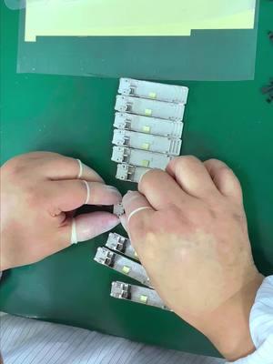 Manual assembly of the module housing, sophisticated production process. https://www.qsfptek.com/ #qsfptek #networking #opticaltransceiver #sfp #qsfp28 #opticalmodule