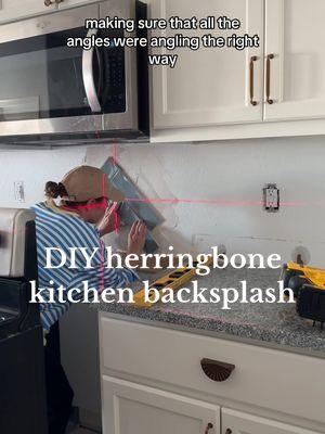 I’m tiling our kitchen backsplash! I picked up a really pretty 3”x12” blue tile & instead of doing a traditional horizontal staggered subway style pattern.. I decided to do something I knew would be tricky,but hopefully worth the work.. a herringbone pattern!  I spent a couple hours on day 1 laying about a third of the tiles. There were soooo many cuts. I went back and forth between the wet saw and the manual tiles cutter about 200 times.  #diybacksplash #herringbonebacksplash #diykitchenrenovation #backsplashideas #bluebacksplashtile #doityourself #kitchenmakeover #diytilebacksplash 