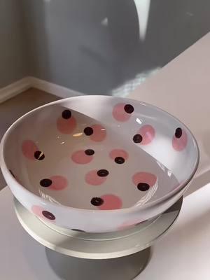 Look at this bowl.Its design is simple yet fashionable.The white bowl is dotted with pink and black circular patterns,just like a lovely little planet floating in the bowl,full of dream #ceramics #bowl 