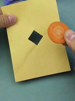 How can you pass a slice of carrot through the hole in the paper?#puzzle#iq#iqtest